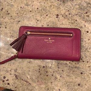 Maroon Kate Spade Neda Tassel zip around Wallet